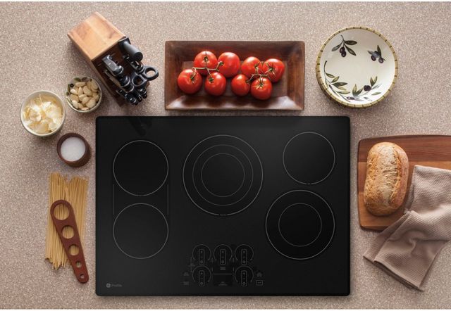 GE Profile™ 30" Stainless Steel/Black Built-In Electric Cooktop-4