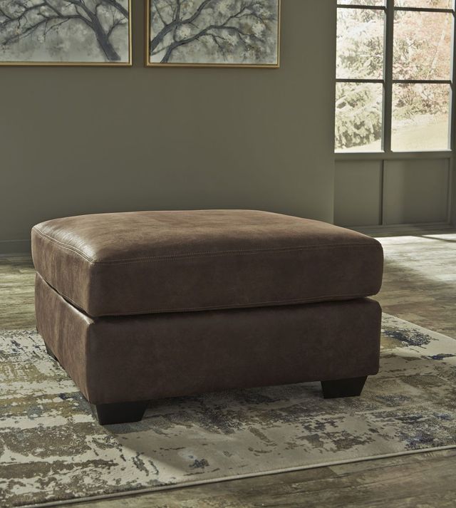 Signature Design by Ashley® Bladen Coffee Ottoman-1
