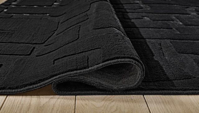 Signature Design by Ashley® Gibbswell Black 5'x7' Area Rug-2