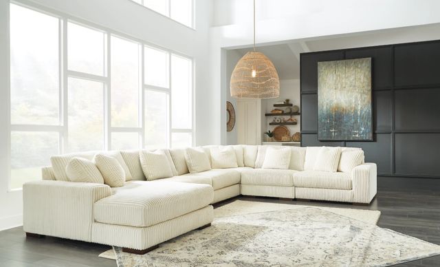 Signature Design by Ashley® Lindyn 6-Piece Ivory Left-Arm Facing Sectional and Chaise-1