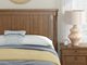 Signature Design by Ashley® Rowlenstown Brown Queen Poster Bed-4