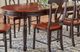 A-America® British Isles Antique Oak Extendable Leg Dining Table with Black Base-0