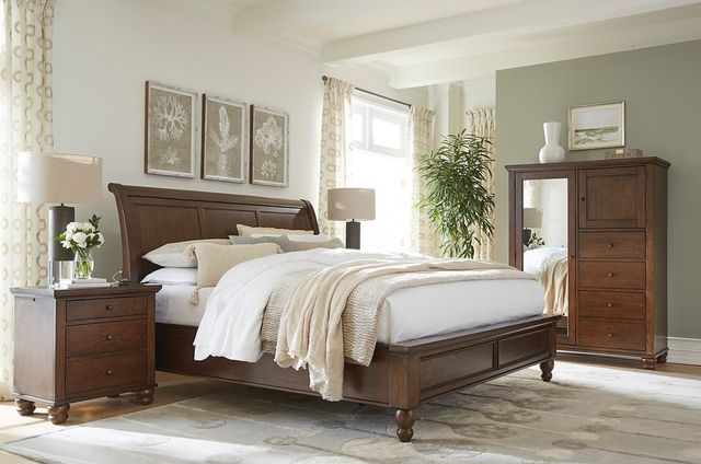 Nightstand beside a bed in a bedroom setup