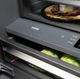 ZLINE Autograph Edition 30" 16.1 Cu. Ft. Black Stainless Steel Built-In Bottom Freezer Refrigerator with Water Dispenser and Ice Maker with Graphite Gray Interior and Polished Gold Helix Handles-3