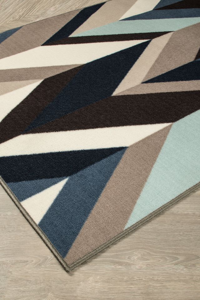 Signature Design by Ashley® Keelia Blue/Brown/Gray 5' x 7' Medium Area Rug-1