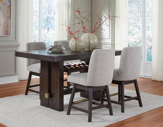 Credit: Signature Design by Ashley Front view of a modern dining room with a contemporary table set