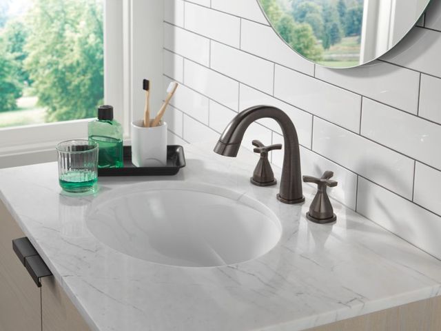 Delta Stryke® Venetian Bronze 2-Handle Widespread Pull Down Bathroom Faucet-1