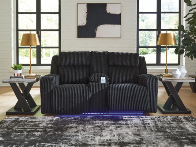 Signature Design by Ashley® Forest Lake Black Power Reclining Loveseat with Console and Adjustable Headrest-4