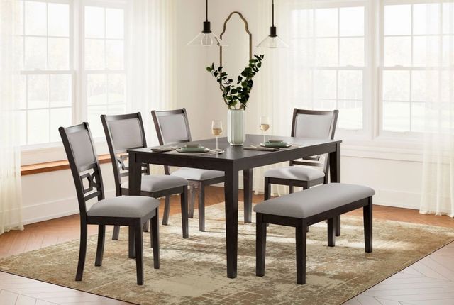 Front view of a casual dining room with a table with bench seating