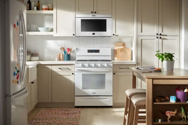 Whirlpool® 1.1 Cu. Ft. White Over The Range Microwave-6