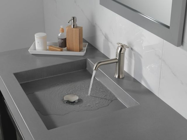 Delta Trinsic® Stainless 7" Single Handle Wheel Bathroom Faucet with Drain-1