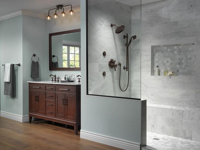 Delta Cassidy® Venetian Bronze Metal Cross Handle Set - Deck Mount Bathroom and Bidet-1