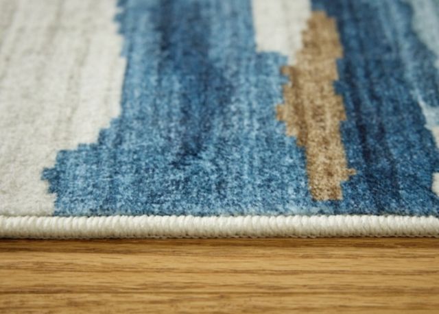 Signature Design by Ashley® Vinlett Blue/Brown/Cream 5'x7' Area Rug-1