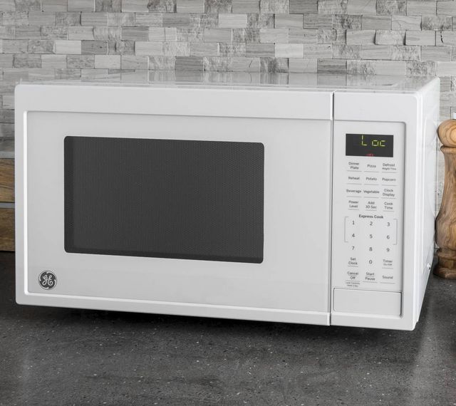GE® 0.9 Cu. Ft. White Countertop Microwave-5