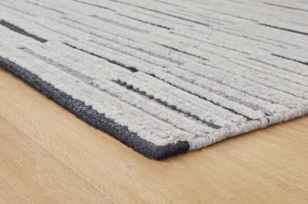 Signature Design by Ashley® Pomfret Black/Cream/Gray 5'x7' Area Rug-2