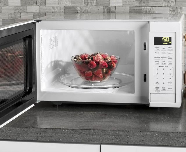GE® 0.9 Cu. Ft. White Countertop Microwave-4