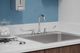 Elkay Chrome 8" Centerset Concealed Deck Faucet with 4" Gooseneck Spout and 6" Wristblade Handles-1