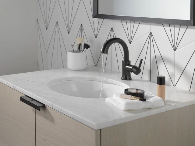 Delta Trinsic® Matte Black Single Handle Lever Pull-Down Bathroom Faucet with Drain-1