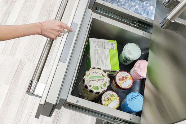 High-end refrigerator blending into modern cabinetry High-end refrigerator blending into modern cabinetry