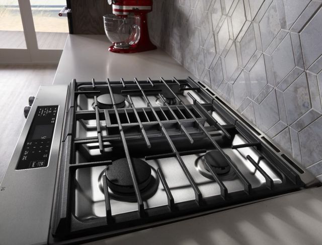 side view of a kitchenaid slide in gas range in a modern kitchen