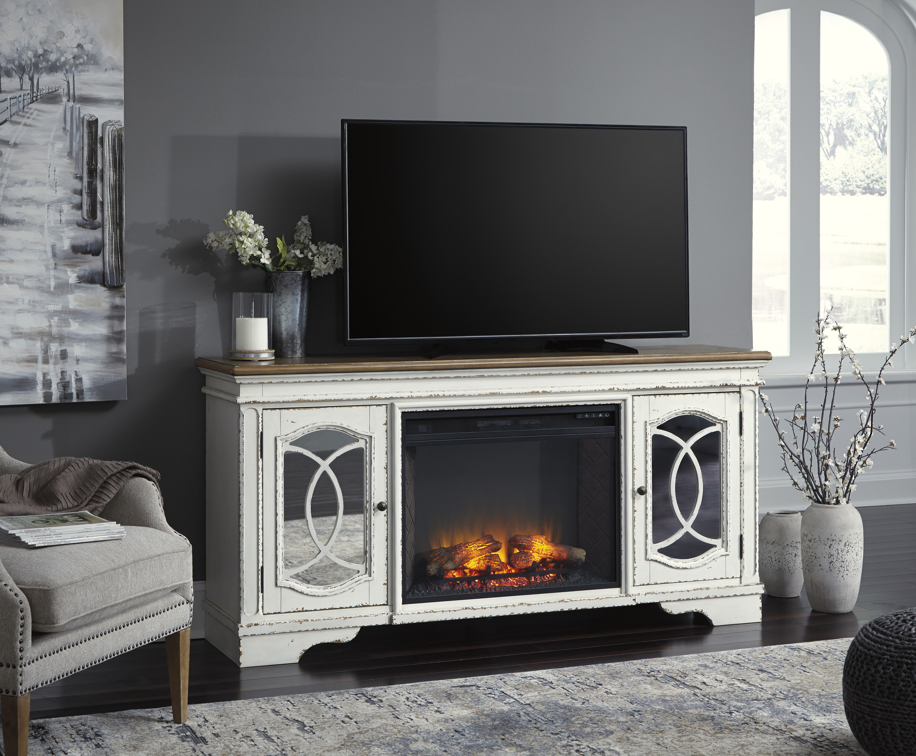 Realyn tv stand with fireplace discount