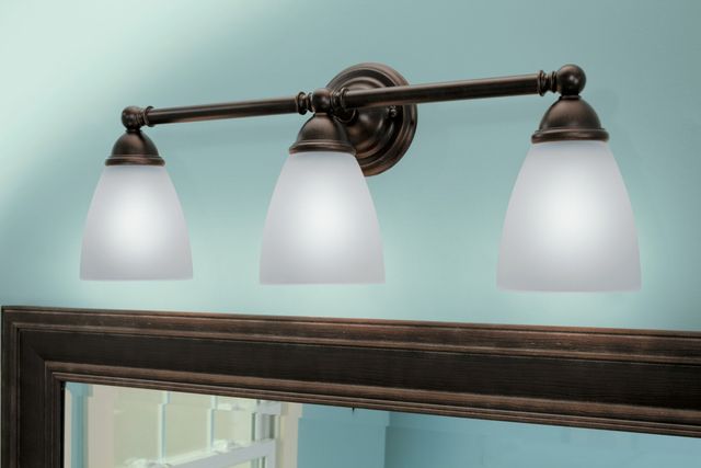 Moen® Brantford™ Oil Rubbed Bronze Three Globe Bath Light-1