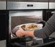 Wolf® E Series Transitional 1.6 Cu. Ft. Stainless Steel Built-In Drop-Down Door Microwave Oven-2