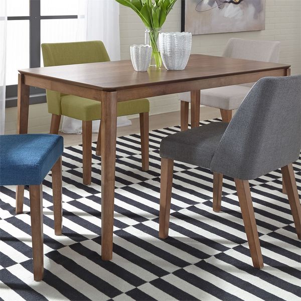 A formal dining room featuring a standard height dining table A formal dining room featuring a standard height dining table