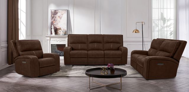 A brown leather reclining sofa demonstrating its power reclining capabilities. A brown leather reclining sofa demonstrating its power reclining capabilities.