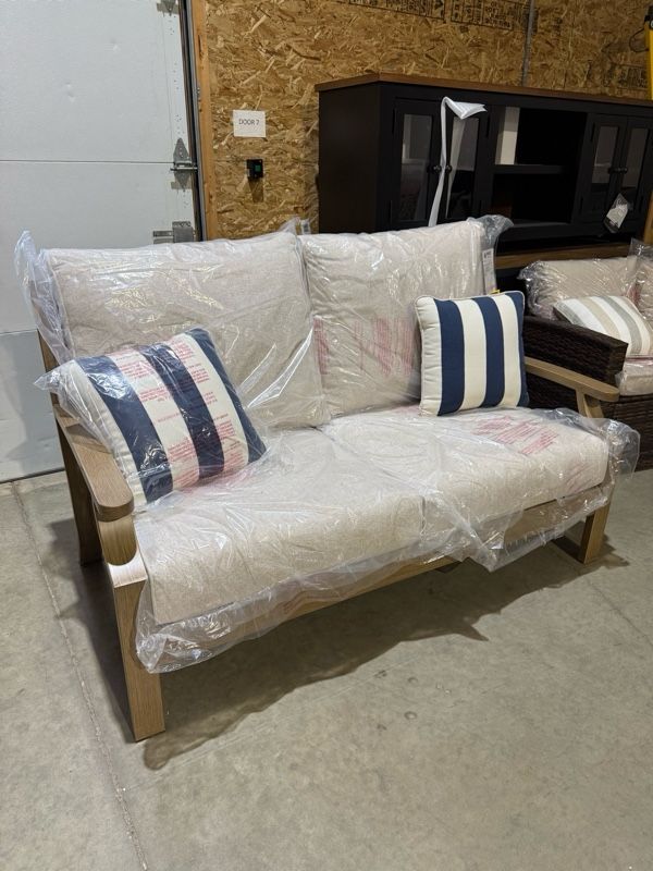 Clearance Signature Design by Ashley® Rainier Ranch Beige/Brown Aluminum/Fabric Outdoor Loveseat-0