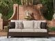 Signature Design by Ashley® Monterey Point Beige/Dark Brown Fabric/Wicker Rattan Outdoor Sofa-1