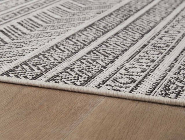 Signature Design by Ashley® Brinoy Black/White 5'x7' Medium Area Rug-1
