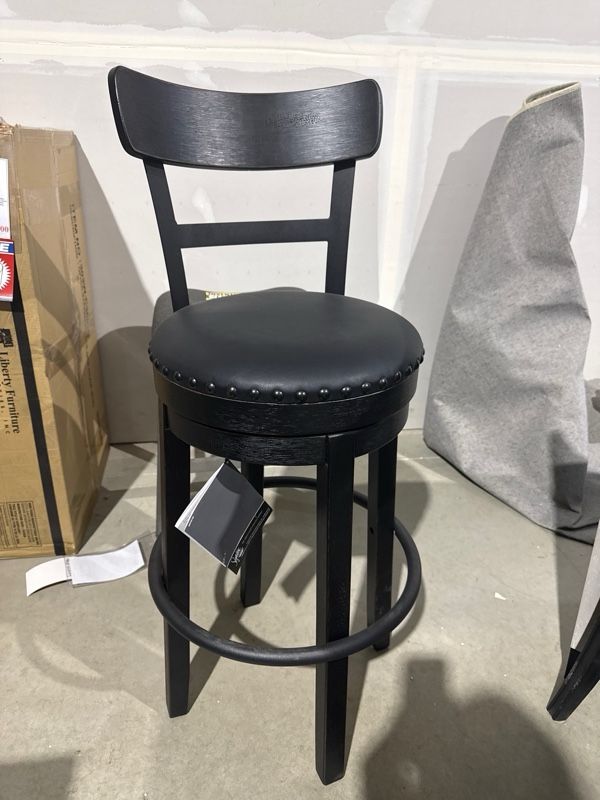 Clearance Signature Design by Ashley® Set of 2 Valebeck Black Tall Upholstered Swivel Bar Stool-1