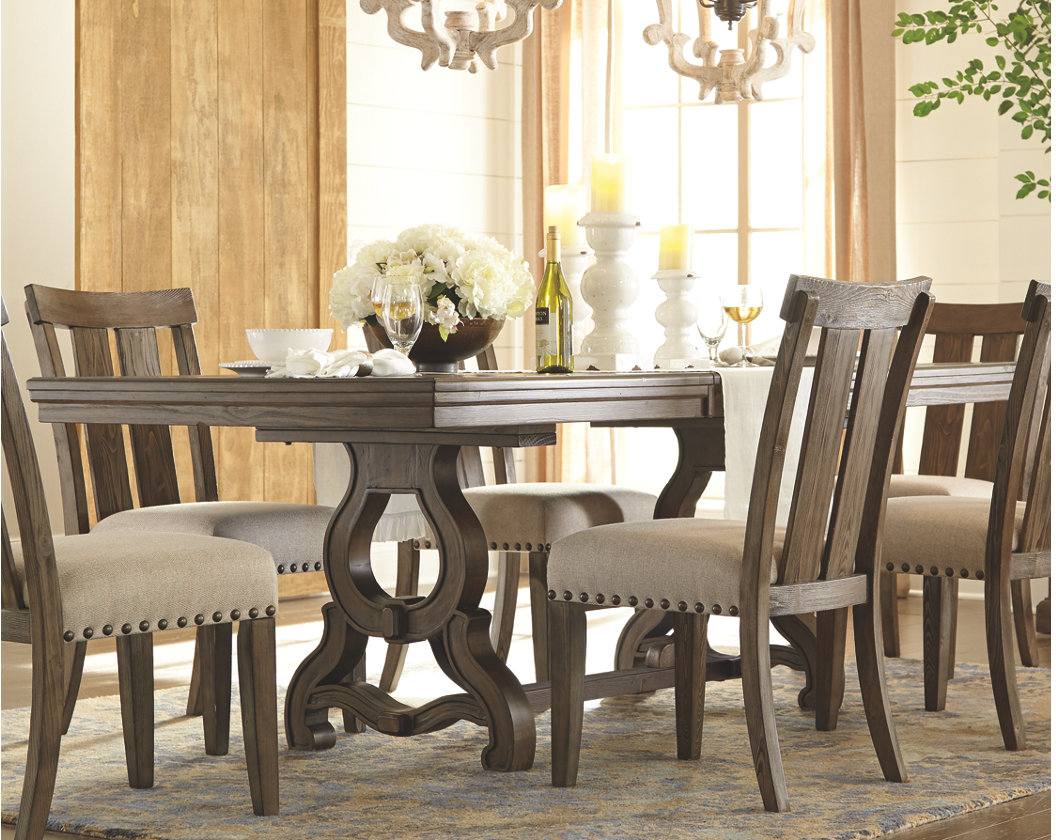 Millennium by Ashley Wendota Brown Dining Extension Table Roby s Furniture Appliance