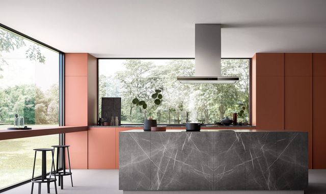 Front view of a luxury kitchen with an island range hood from Falmec