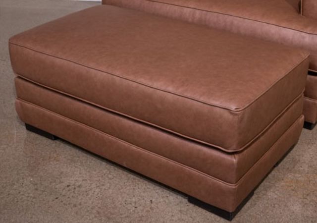 Benchcraft® VillaCourt Caramel Ottoman-1