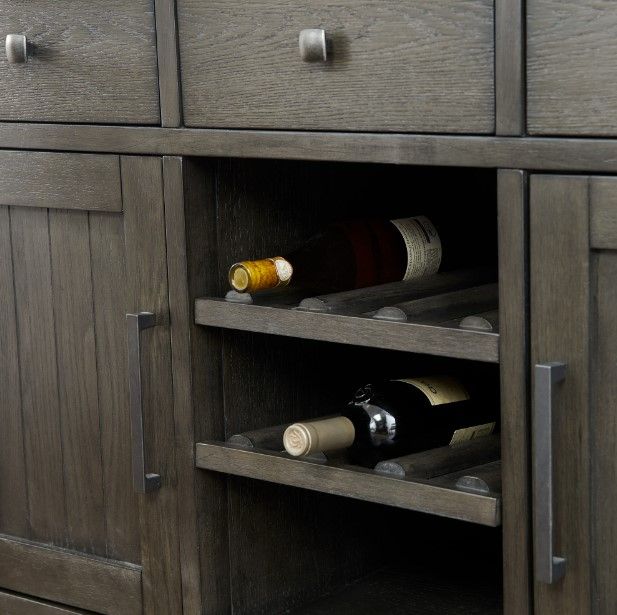 Close view of the wine storage shelves on a dining room buffet