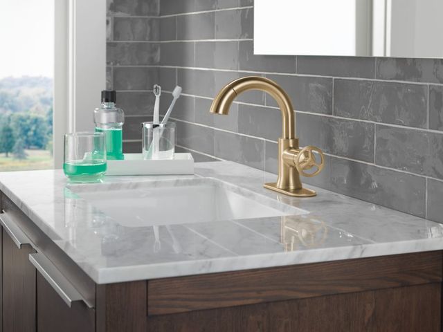 Delta Trinsic® Champagne Bronze Single Handle Wheel Pull-Down Bathroom Faucet with Drain-1