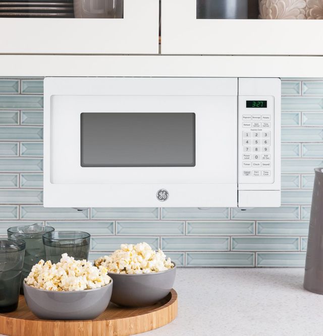 GE® 0.7 Cu. Ft. White Countertop Microwave-3