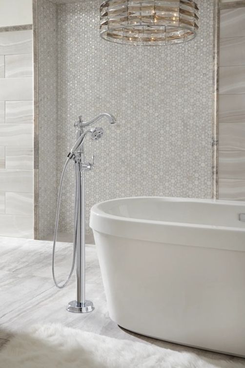 Delta Cassidy® Chrome Single Handle Floor Mount Tub Filler Trim with Hand Shower -1