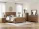 Signature Design by Ashley® Rowlenstowe 4-Piece Brown King Bedroom Set-1