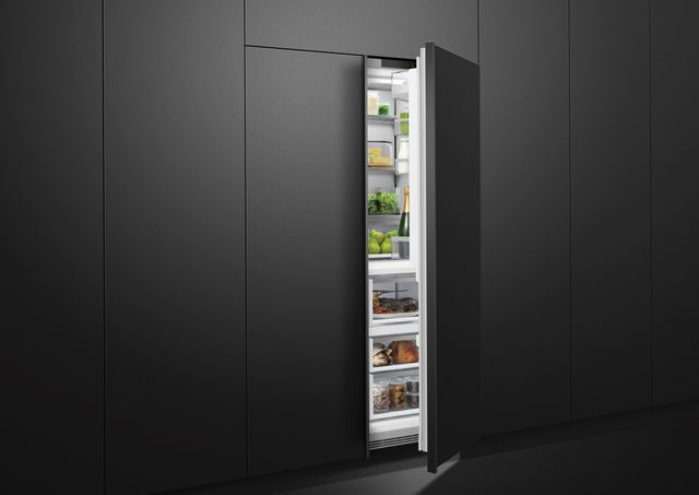 Front view of a grey panel wall with a Fisher and Paykel column refrigerator