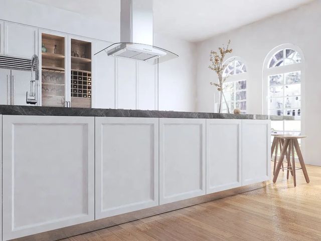 Front view of a XO island range hood in a modern kitchen