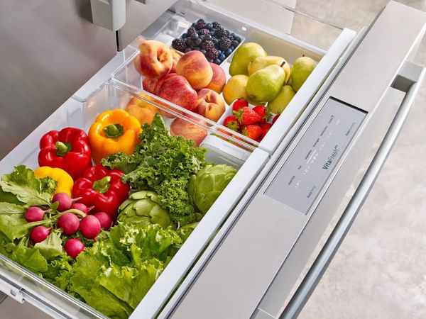 Inside of a Bosch refrigerator displaying fresh produce