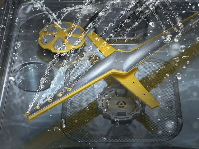 close view of the inside of a samsung dishwasher water sprayer