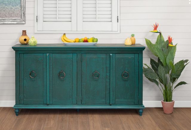 front view of a green stained wooden sideboard with small vases and a bowl of fruit on top