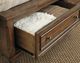 Signature Design by Ashley® Flynnter Medium Brown King Storage Panel Bed-1