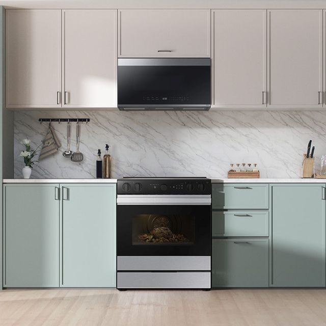 A modern kitchen with matched Samsung Bespoke appliances A modern kitchen with matched Samsung Bespoke appliances