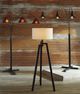 Signature Design by Ashley® Sheriel Black Metal Arc Floor Lamp-4