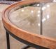 Signature Design by Ashley® Noraluna Glass Top Round Cocktail Table with Matte Black Base-1
